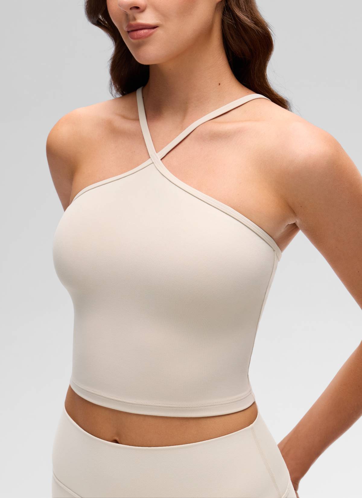 CRZ YOGA Women's Butterluxe Yoga Cross Halter Crop Built in Bra Tank Mojave Tan @model_info:Gelya