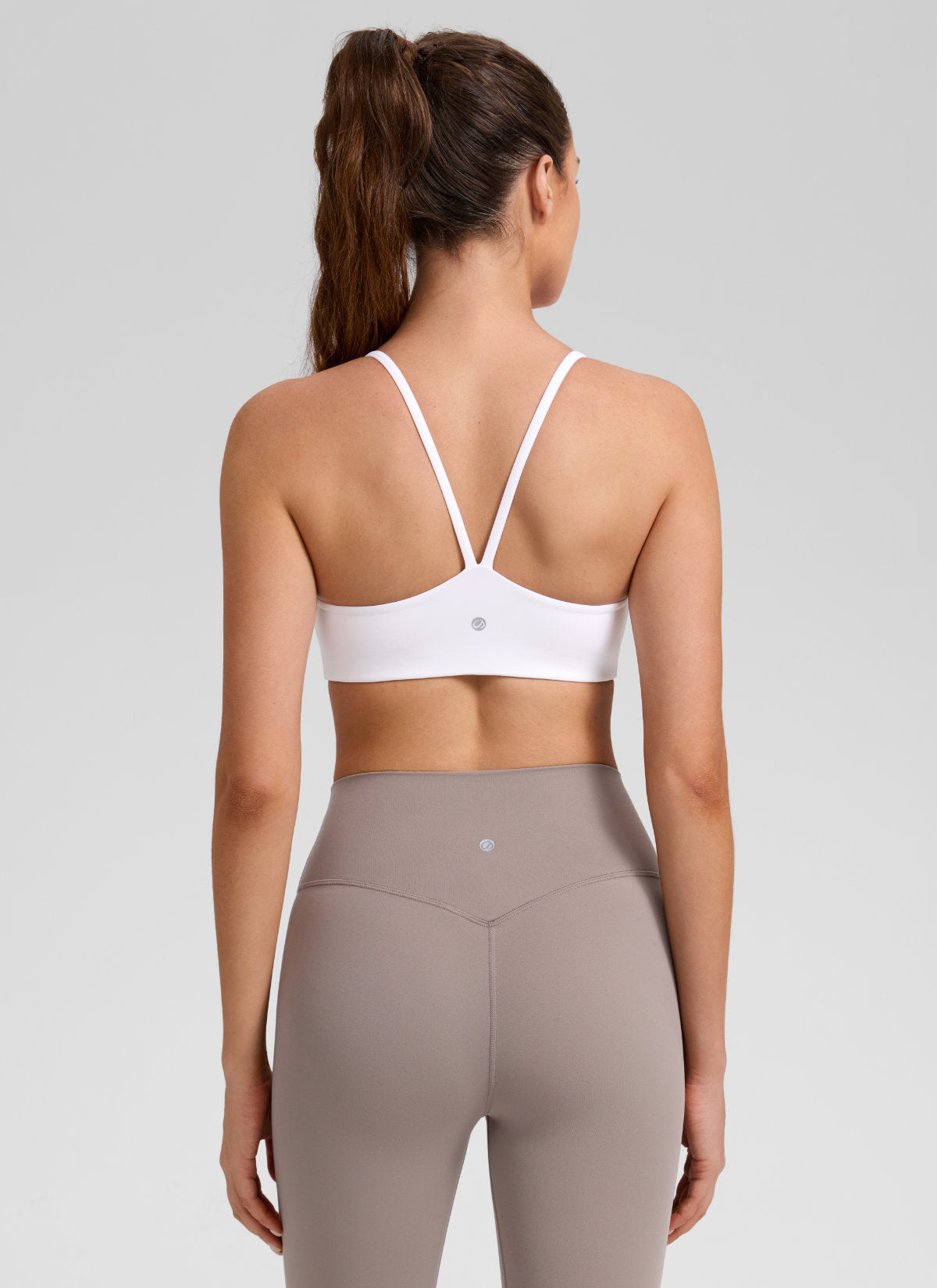CRZ YOGA Women's Butterlift® Yoga V Back Double Lined Sports Bra White @model_info:Gelya