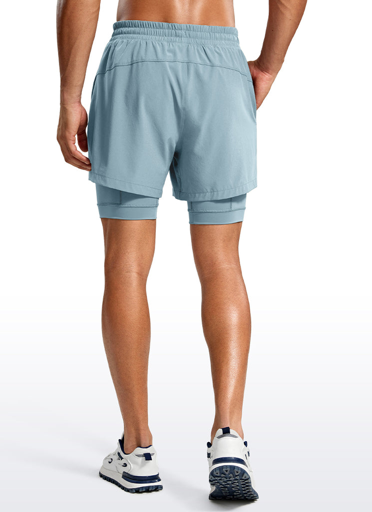 CRZ YOGA Men's Train Relaxed Fit Feathery-Fit 2 in 1 Shorts 5'' with Long Liner Light grayish blue