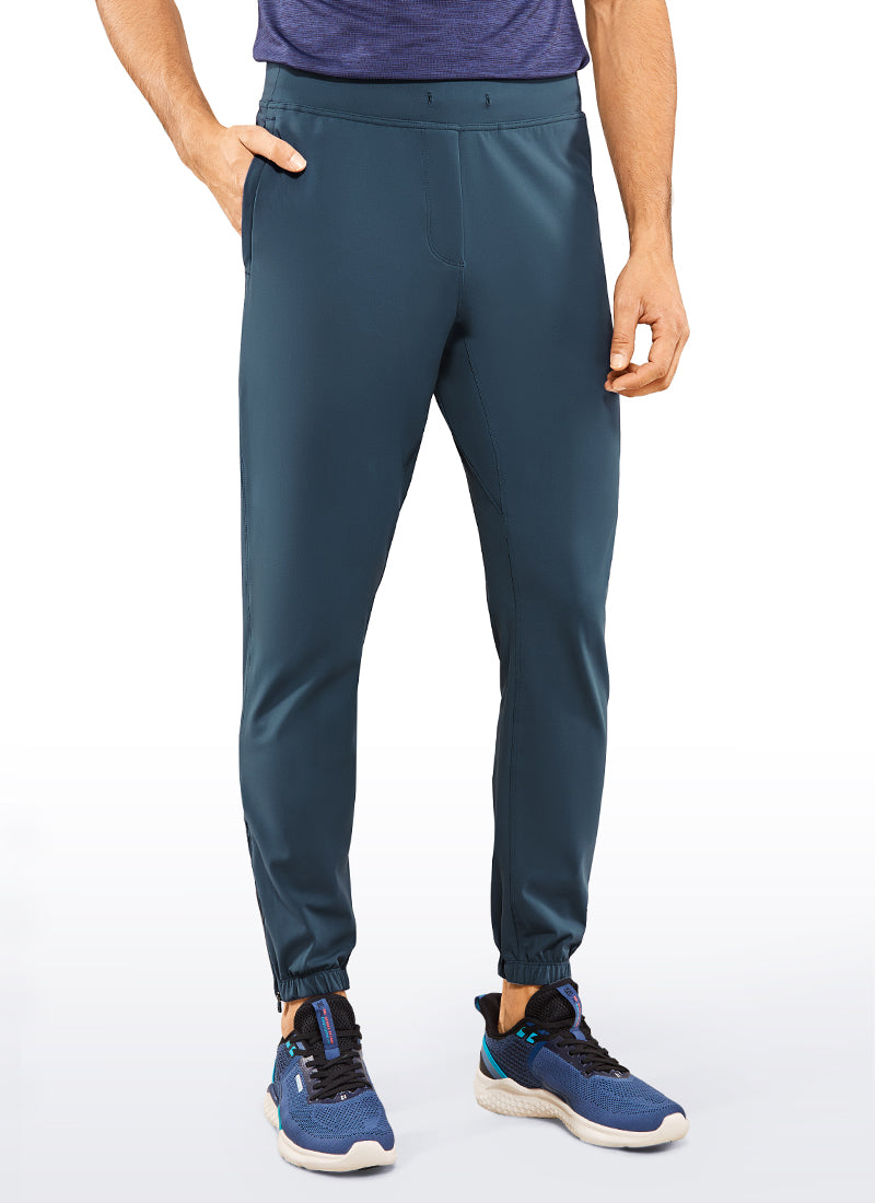 CRZ YOGA Men's Run Slim Fit On the Travel Joggers 30''- Ankle Zipper True Navy