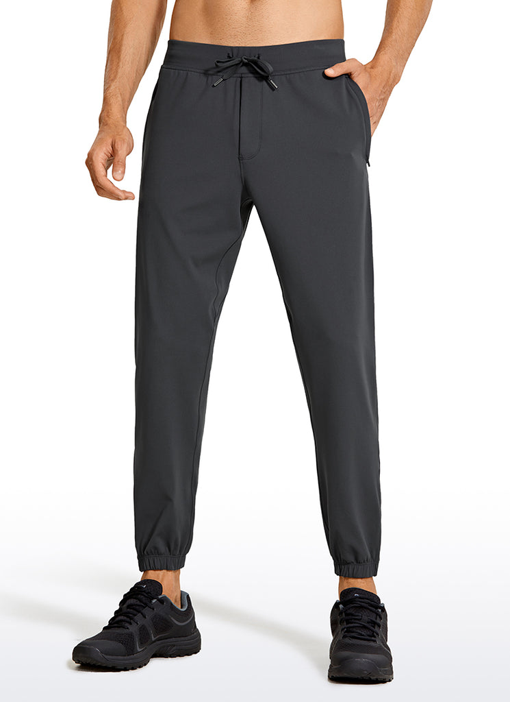 CRZ YOGA Men's Run Slim Fit On the Travel Joggers 28''- Ankle Zipper True Navy