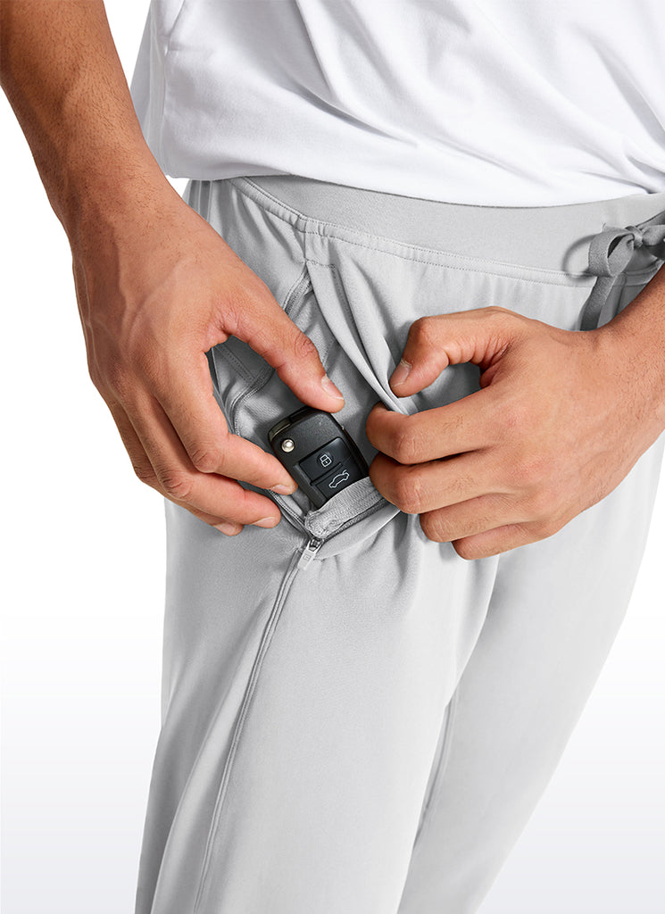 CRZ YOGA Men's Run Slim Fit On the Travel Joggers 28''- Ankle Zipper Platinum Grey