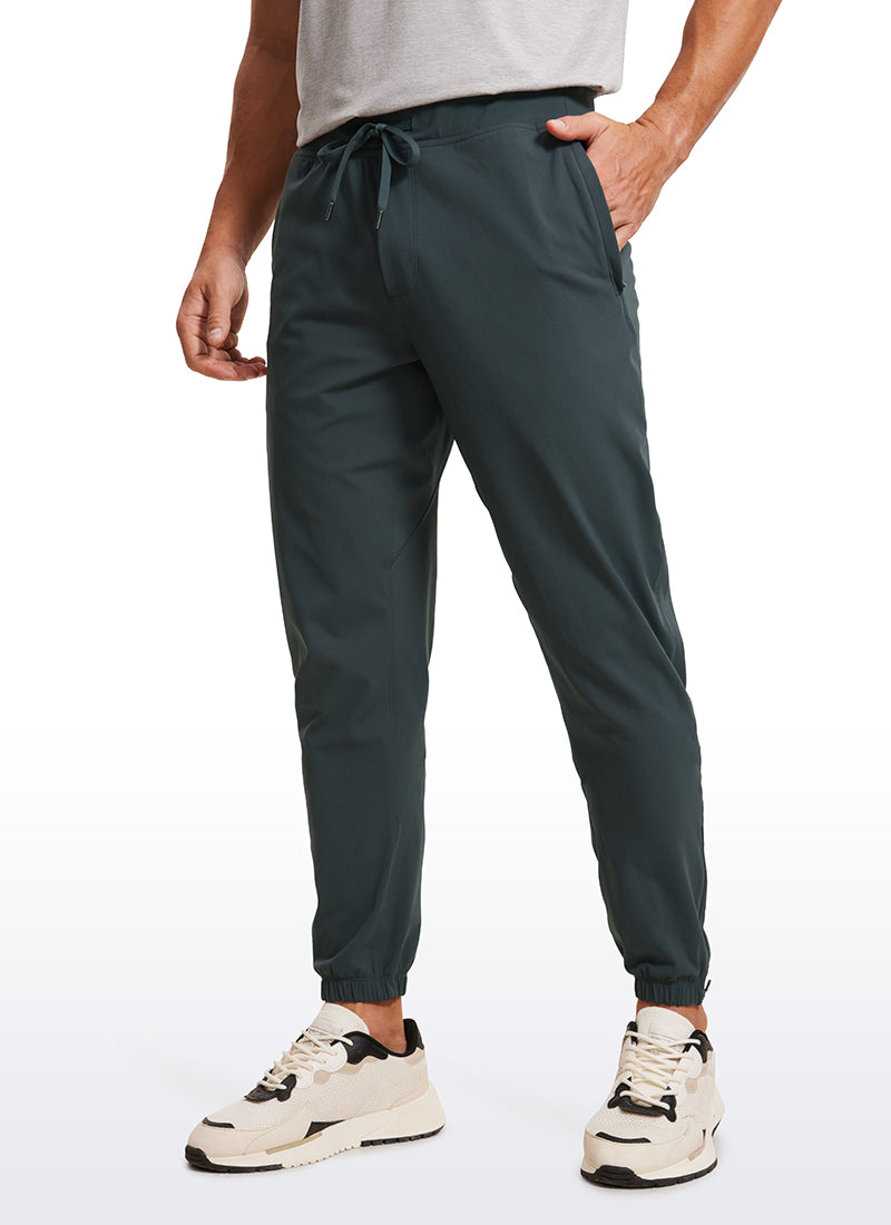 CRZ YOGA Men's Run Slim Fit On the Travel Joggers 32''- Ankle Zipper Melanite