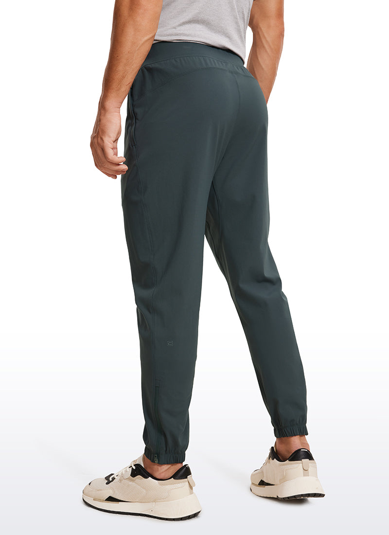 CRZ YOGA Men's Run Slim Fit On the Travel Joggers 32''- Ankle Zipper Melanite