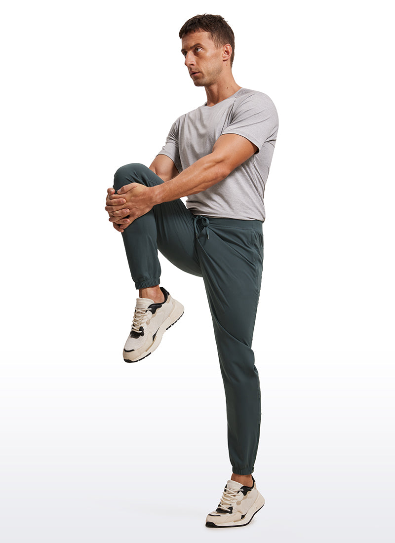 CRZ YOGA Men's Run Slim Fit On the Travel Joggers 32''- Ankle Zipper Melanite