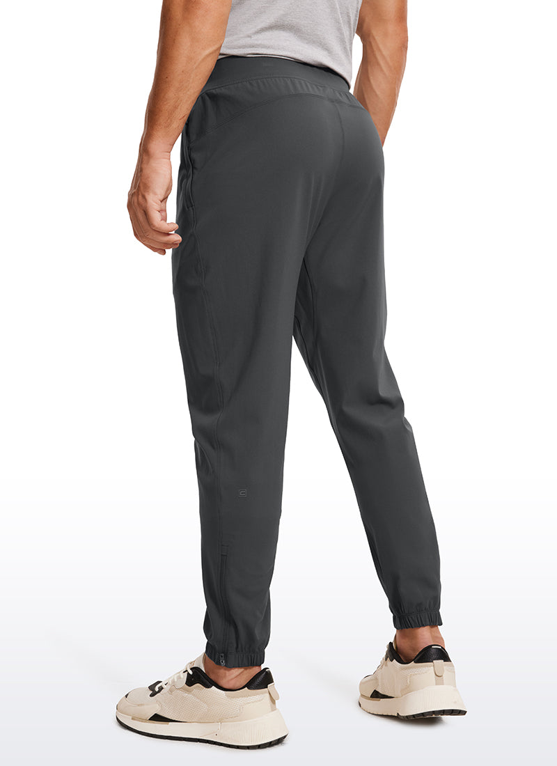 CRZ YOGA Men's Run Slim Fit On the Travel Joggers 32''- Ankle Zipper Ink Gray
