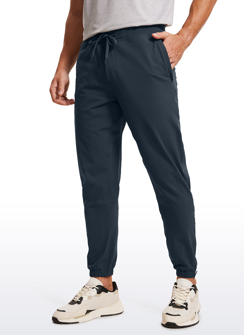 CRZ YOGA Men's Run Slim Fit On the Travel Joggers 32''- Ankle Zipper True Navy