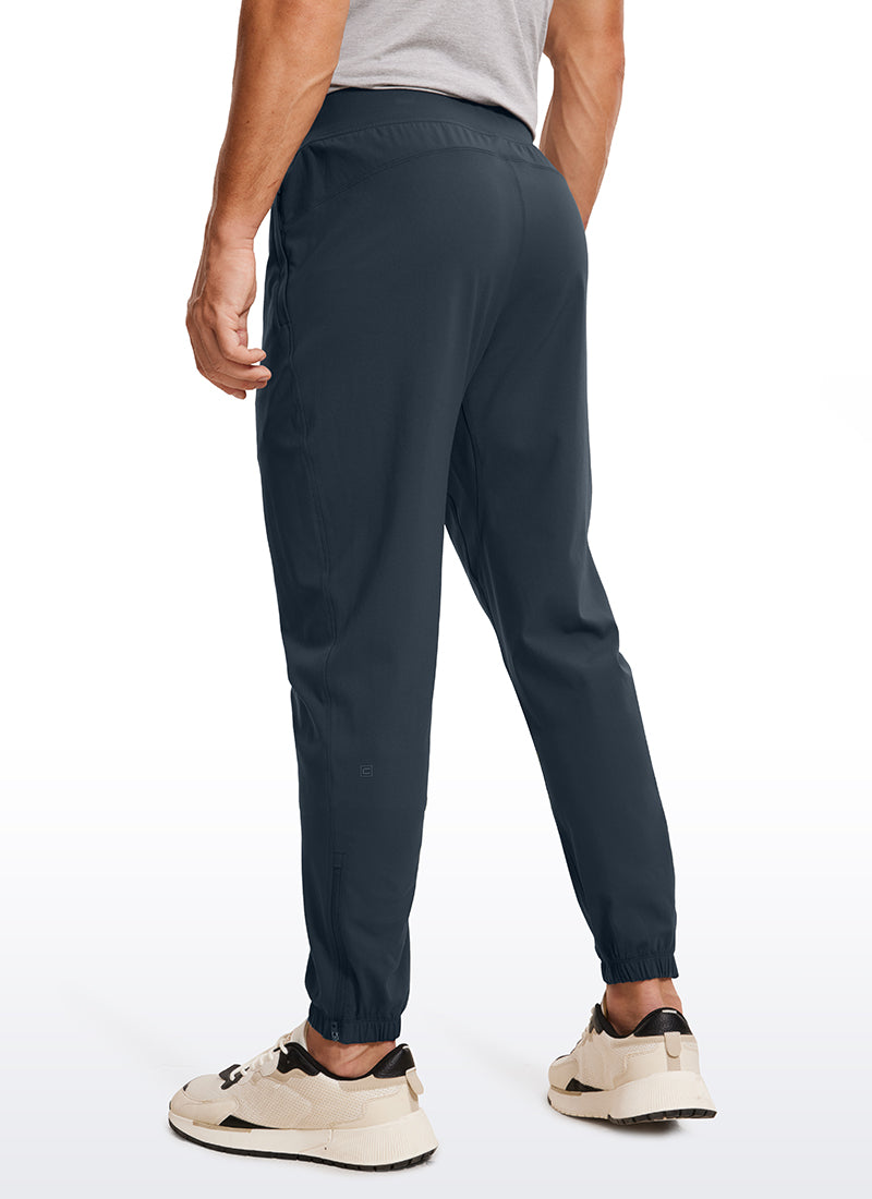 CRZ YOGA Men's Run Slim Fit On the Travel Joggers 32''- Ankle Zipper True Navy