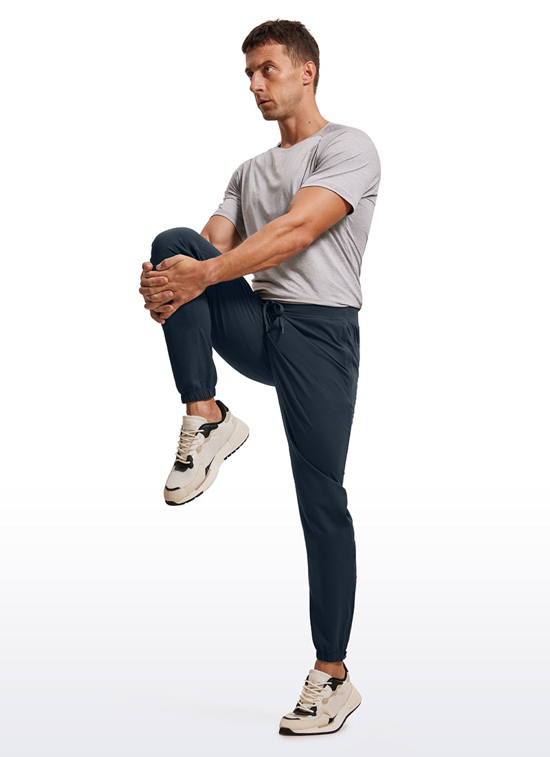 CRZ YOGA Men's Run Slim Fit On the Travel Joggers 32''- Ankle Zipper True Navy
