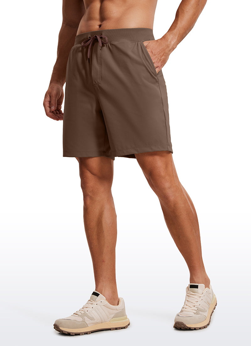 CRZ YOGA Men's Train Relaxed Fit On the Travel Linerless Shorts 7'' Dark Olive Brown