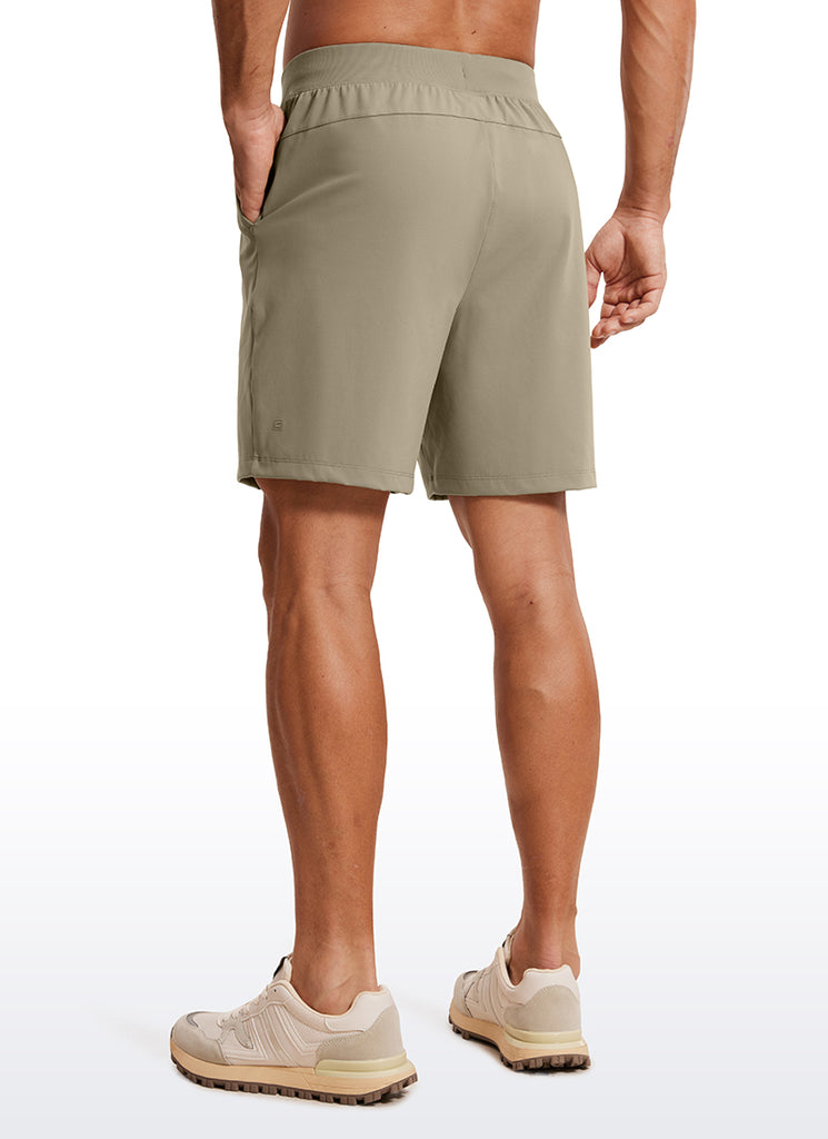 CRZ YOGA Men's Train Relaxed Fit On the Travel Linerless Shorts 7'' Dark Brown