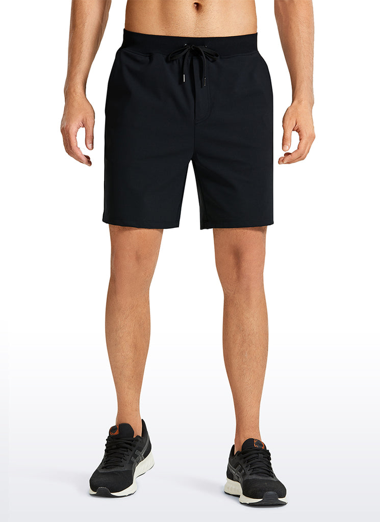 CRZ YOGA Men's Train Relaxed Fit On the Travel Linerless Shorts 7'' True Navy