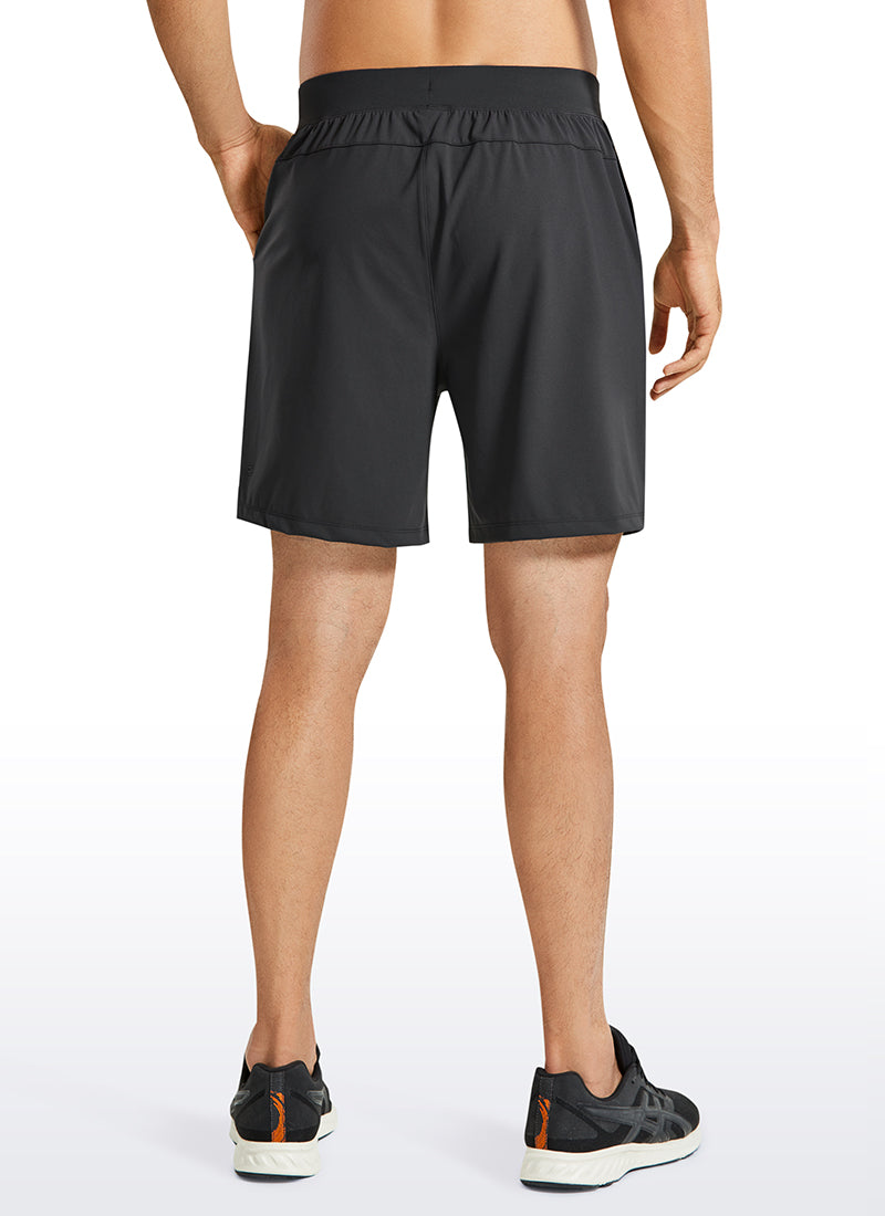 CRZ YOGA Men's Train Relaxed Fit On the Travel Linerless Shorts 7'' Ink Gray