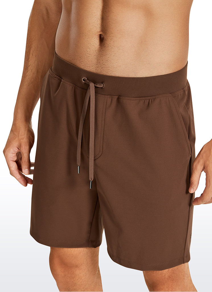 CRZ YOGA Men's Train Relaxed Fit On the Travel Linerless Shorts 7'' Dark Brown