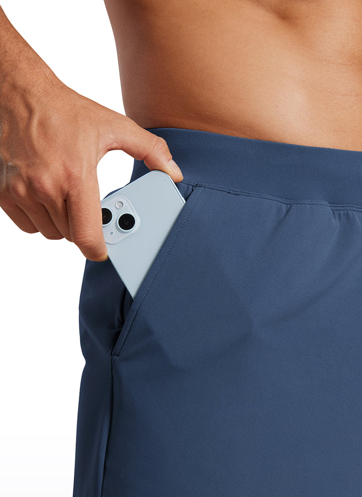 CRZ YOGA Men's Train Relaxed Fit On the Travel Linerless Shorts 5'' Electric Blue