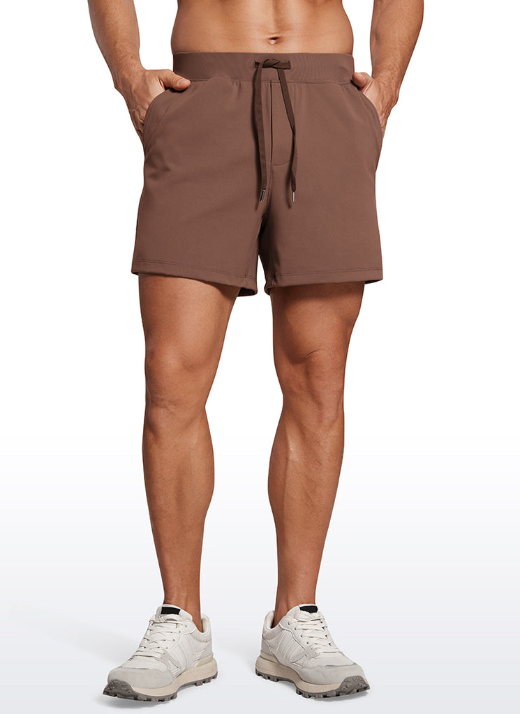 CRZ YOGA Men's Train Relaxed Fit On the Travel Linerless Shorts 5'' Coffee Brown