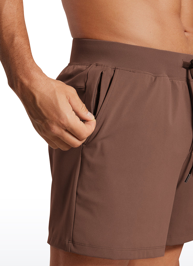CRZ YOGA Men's Train Relaxed Fit On the Travel Linerless Shorts 5'' Coffee Brown