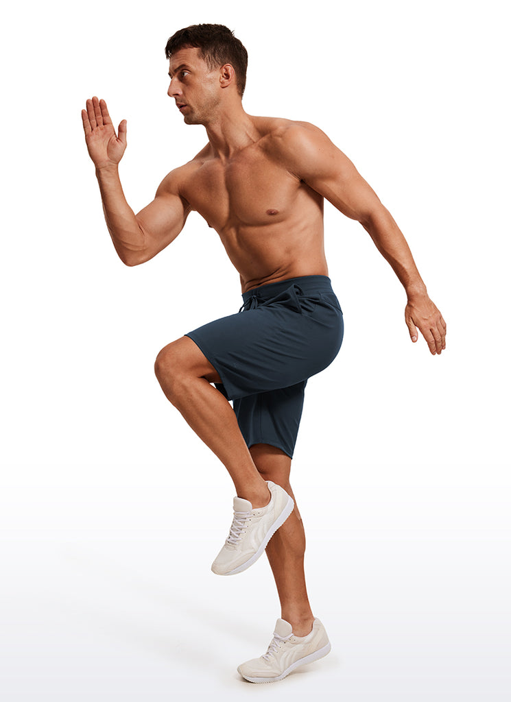 CRZ YOGA Men's Train Relaxed Fit On the Travel Linerless Shorts 9'' Chambray Blue