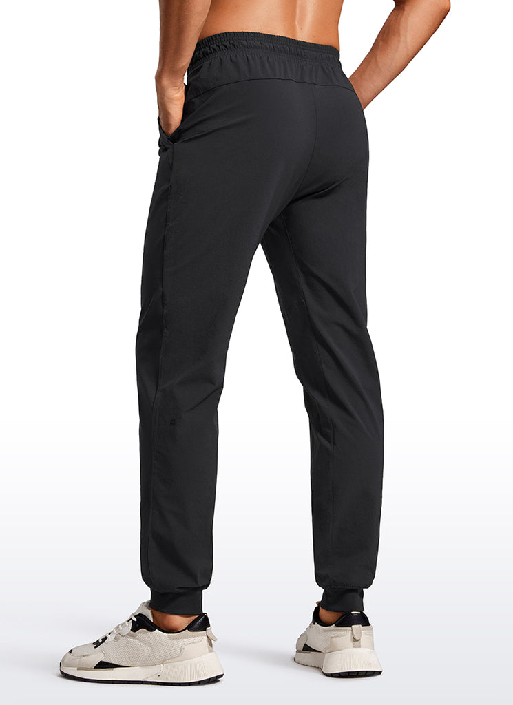 CRZ YOGA Men 31" Lightweight Water Resistant with Zip Pockets Joggers Black