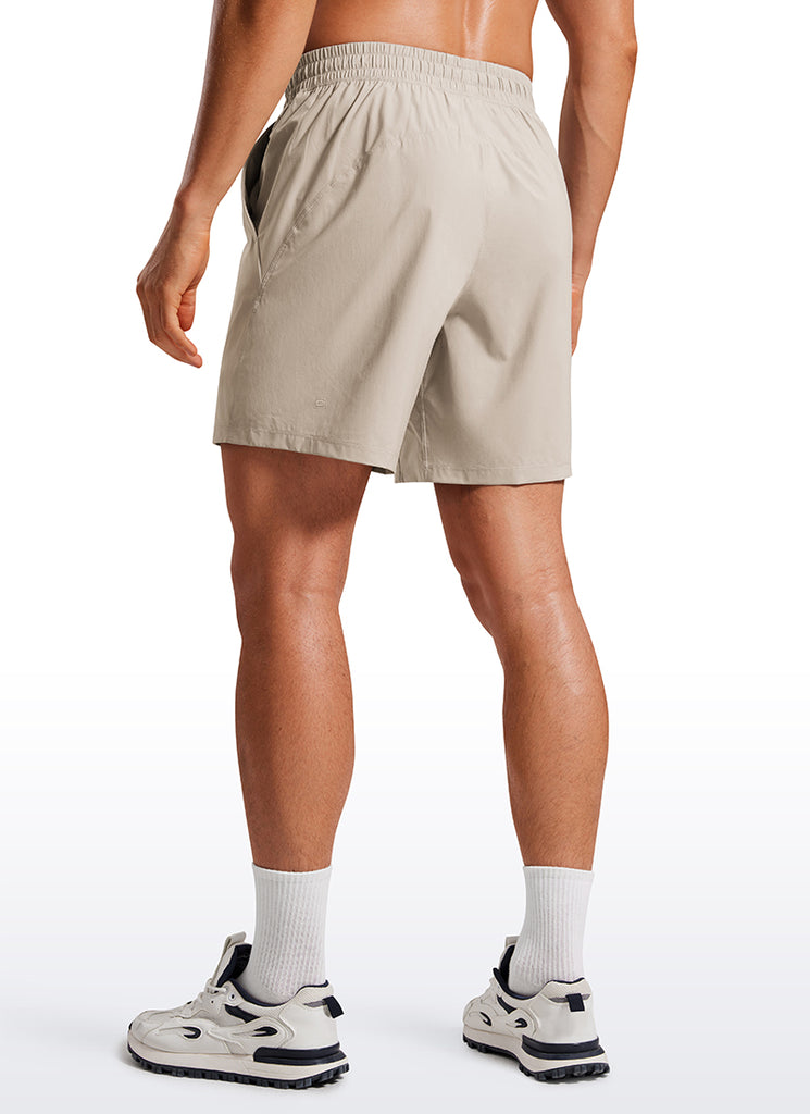 CRZ YOGA Men's Training Quick Dry Pocketed Linerless Shorts 7'' Khaki Sand
