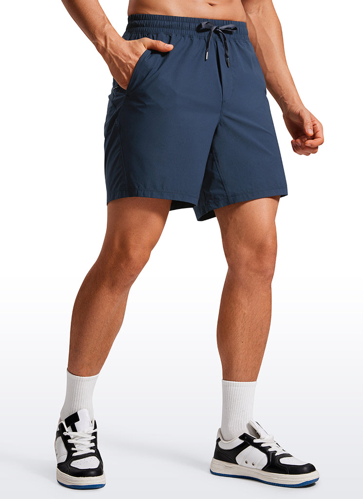 CRZ YOGA Men's Training Quick Dry Pocketed Linerless Shorts 7'' Stelindigo