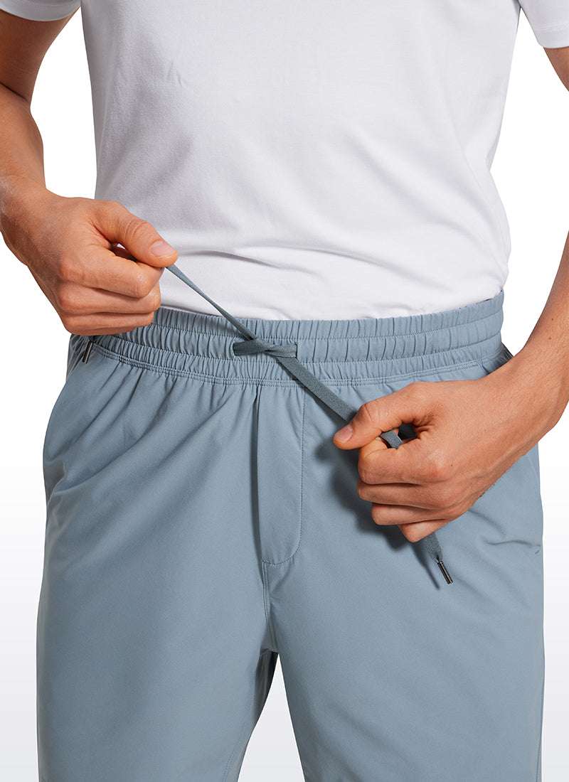 CRZ YOGA Men's Training Quick Dry Pocketed Linerless Shorts 7'' Belgian Blue