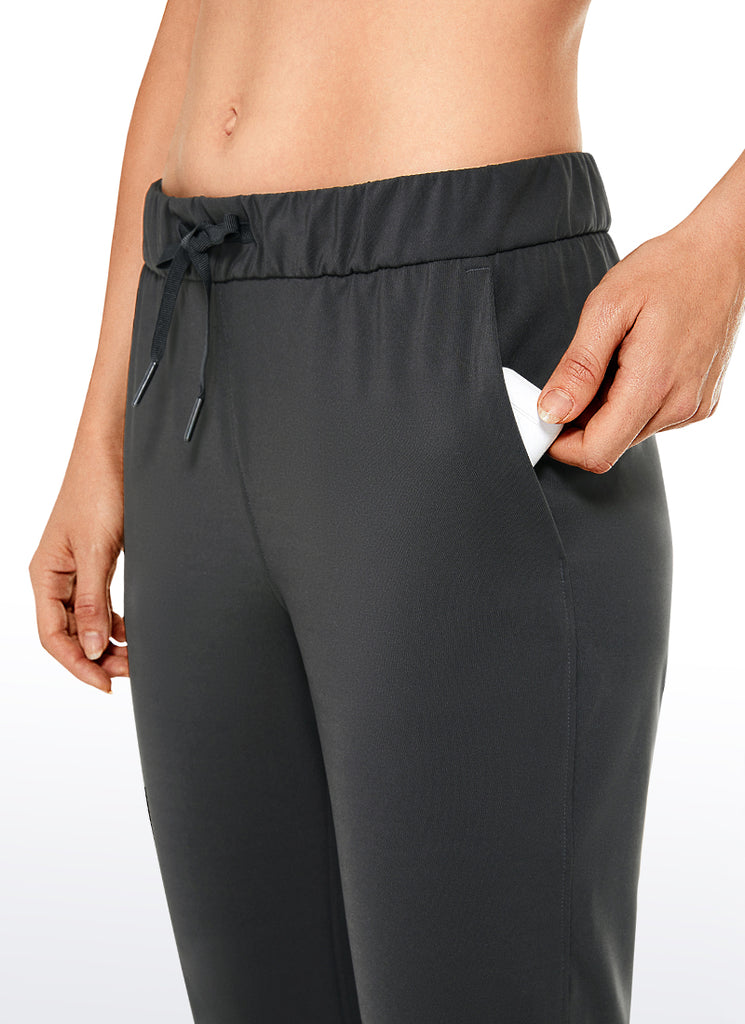 CRZ YOGA Women's Travel Slim Fit Stretch Drawstring 7/8 Pants 27'' Melanite