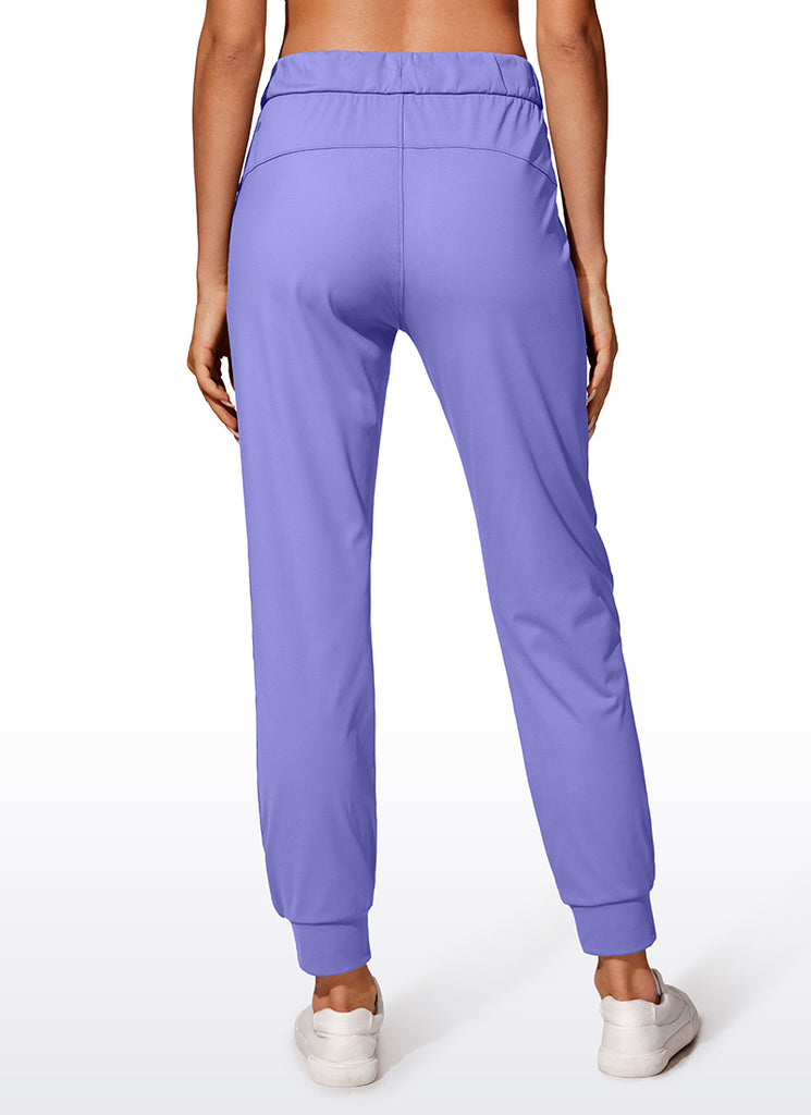 CRZ YOGA Women's Travel Slim Fit Stretch Drawstring Jogger 27'' Dark Lavender Purple