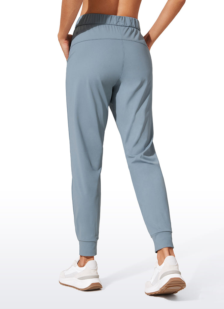 CRZ YOGA Women's Travel Slim Fit Stretch Drawstring Jogger 27'' The Cognac Brown