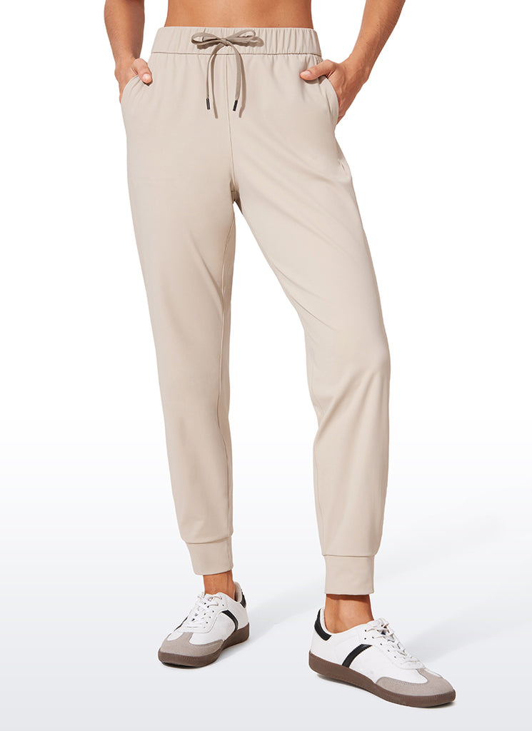 CRZ YOGA Women's Travel Slim Fit Stretch Drawstring Jogger 27'' Dark Lavender Purple