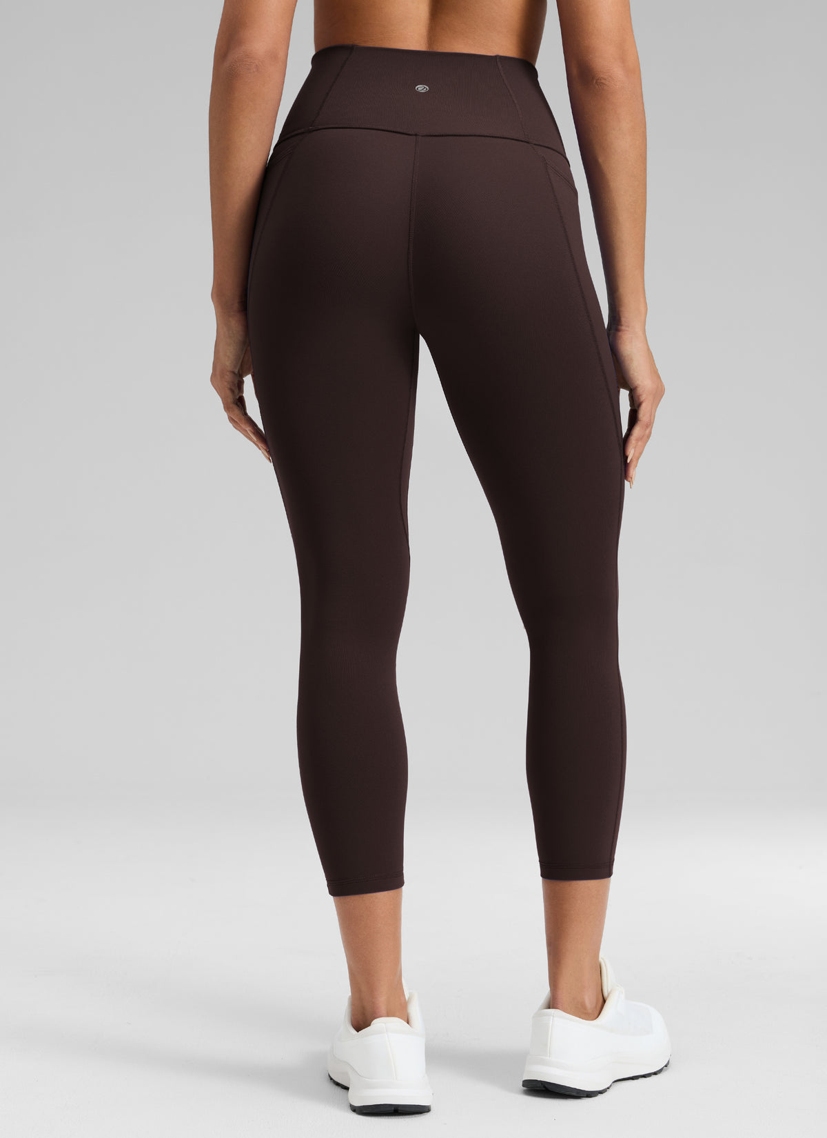 CRZ YOGA Womens Butterluxe High Waist Pockets Capri Leggings 23'' Hot Fudge Brown @model_info:Dany