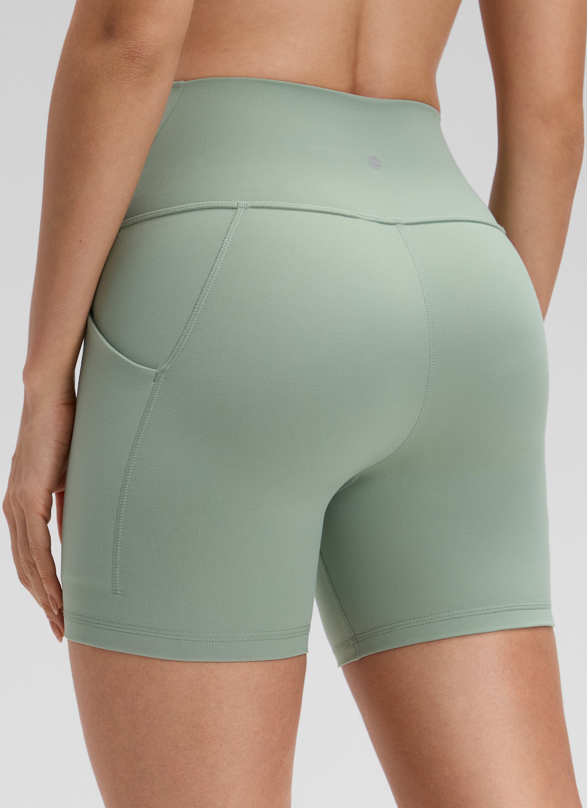 CRZ YOGA Women's Yoga High Rise Biker Butterluxe Pockets Shorts 5'' Green Palm Court @model_info:Bruna