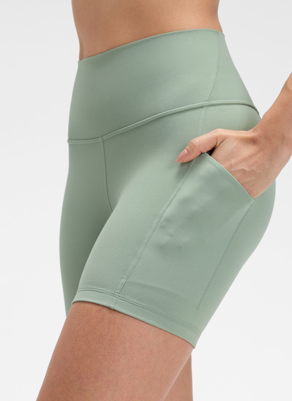 CRZ YOGA Women's Yoga High Rise Biker Butterluxe Pockets Shorts 5'' Green Palm Court @model_info:Bruna