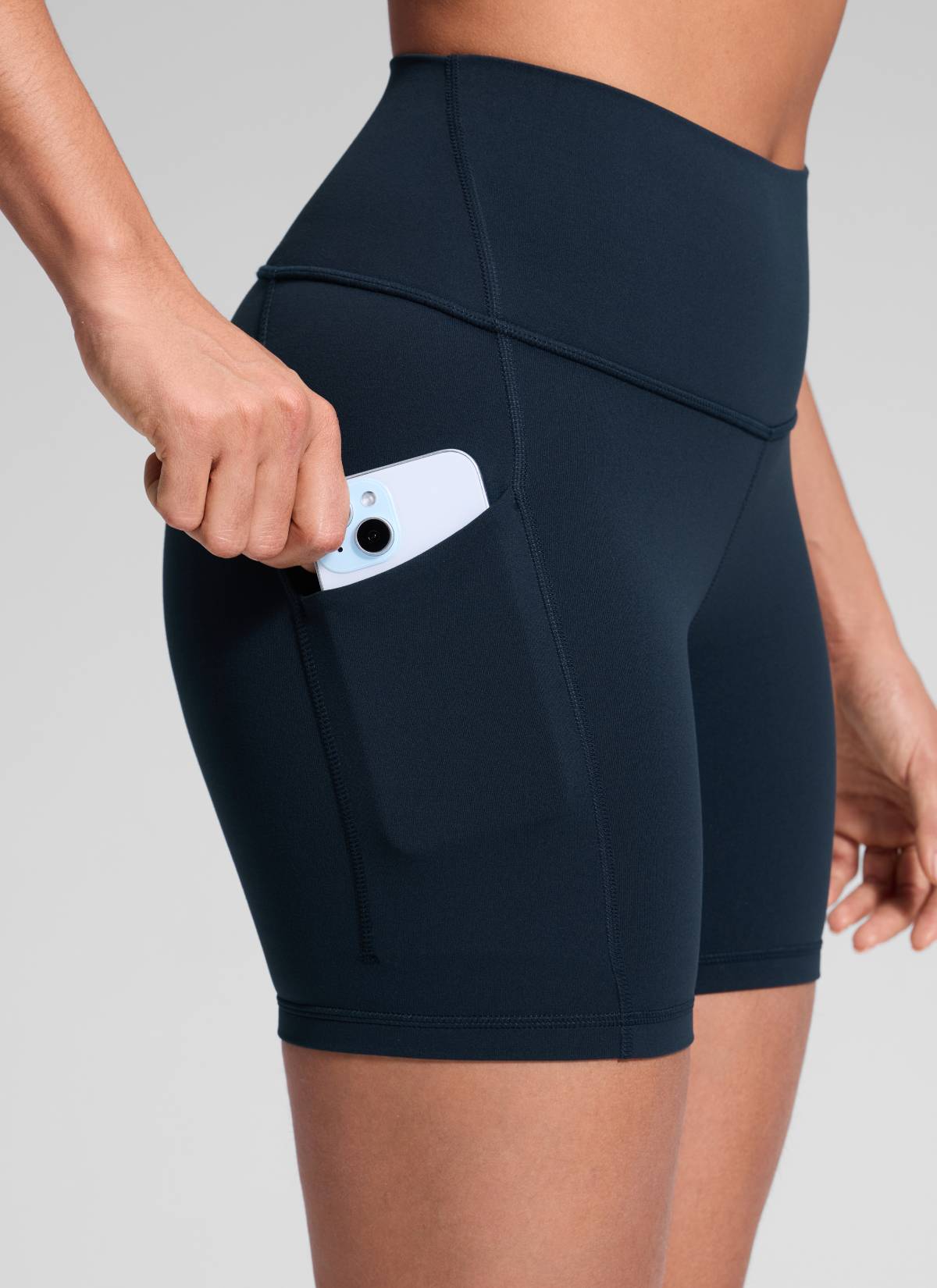 CRZ YOGA Women's Yoga High Rise Biker Butterluxe Pockets Shorts 5'' True Navy @model_info:Dany