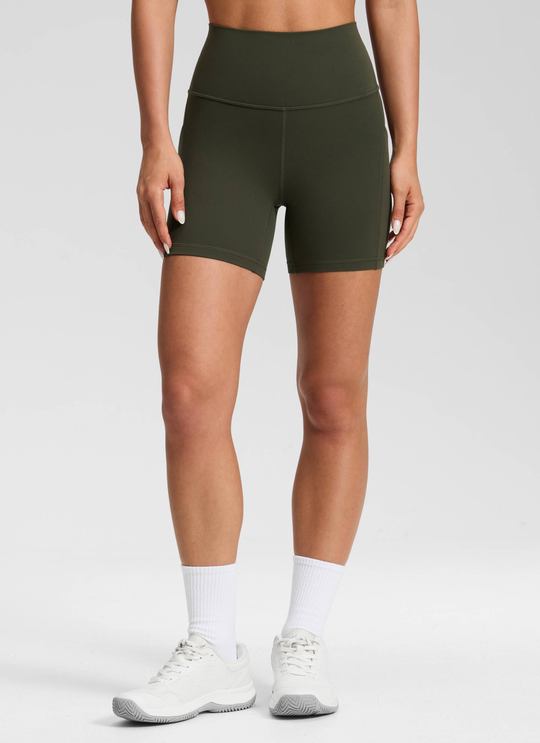 CRZ YOGA Women's Yoga High Rise Biker Butterluxe Pockets Shorts 5'' Olive Green @model_info:Isidora