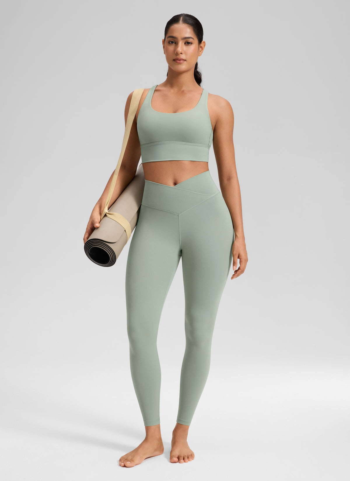 CRZ YOGA Women's High Rise Butterluxe Yoga Leggings 25'' V Cross Waist Green Palm Court @model_info:Carol