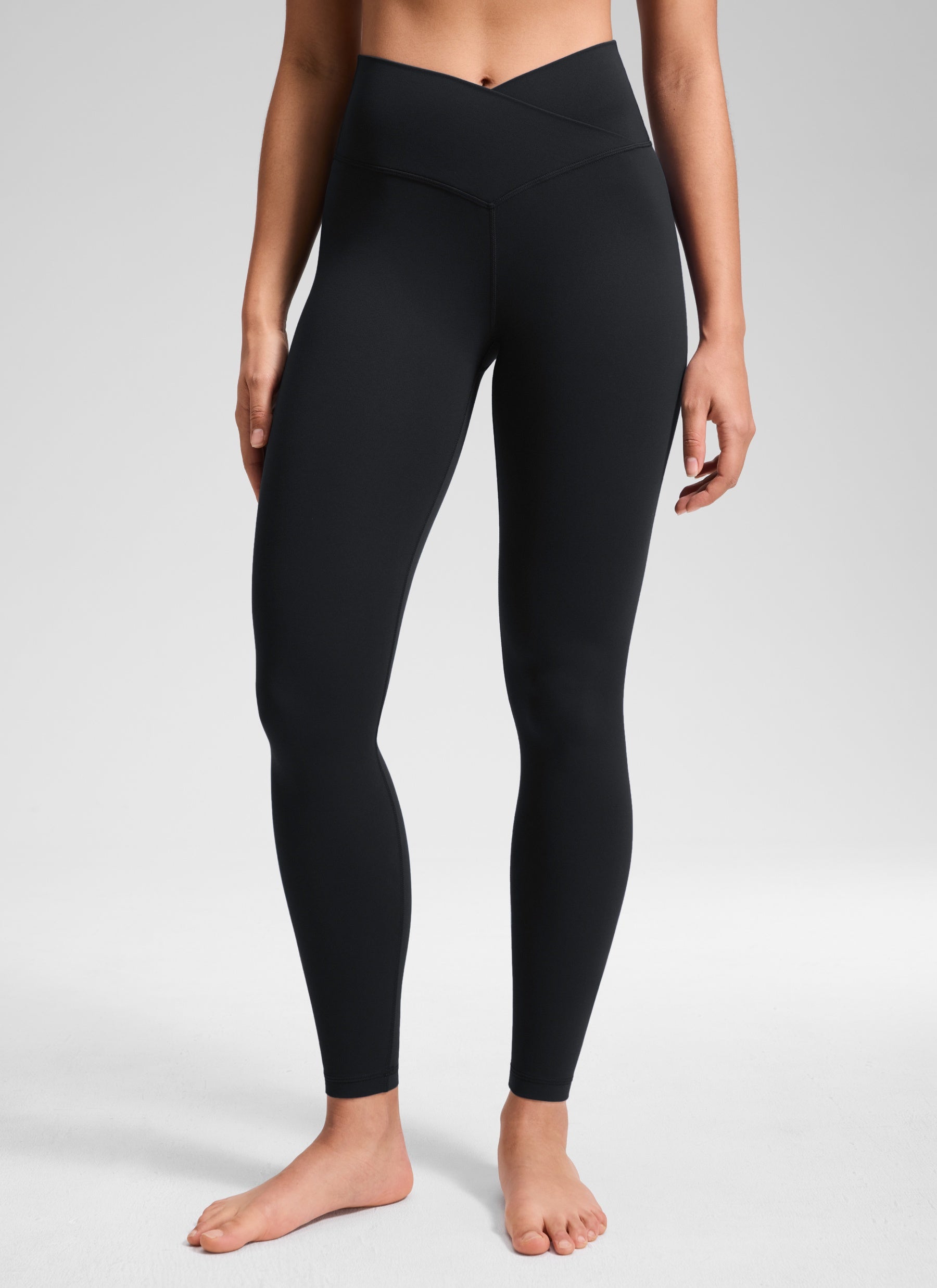 CRZ YOGA Women's High Rise Butterluxe Yoga Leggings 28'' V Cross Waist Black @model_info:Fiona