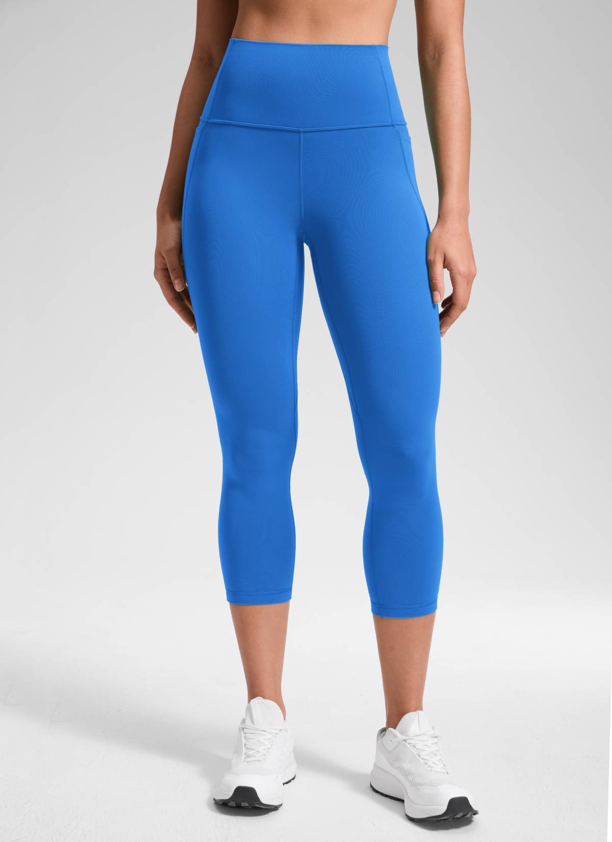CRZ YOGA Women's Yoga High Rise Butterluxe Capri with Pockets 21'' Sparkle Blue @model_info:Fiona