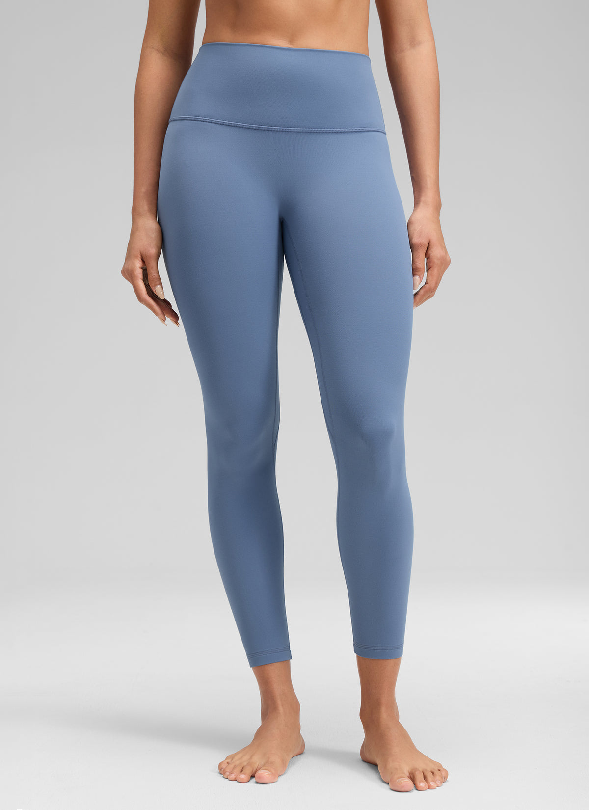CRZ YOGA Women's Butterluxe Yoga High Rise No Front Seam Legging 25'' Washed Denim @model_info:Dany