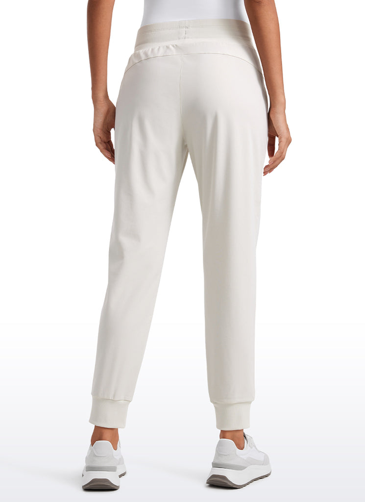 CRZ YOGA Women's Golf All-day Slim-Fit Joggers 27.5'' with pockets Milky White
