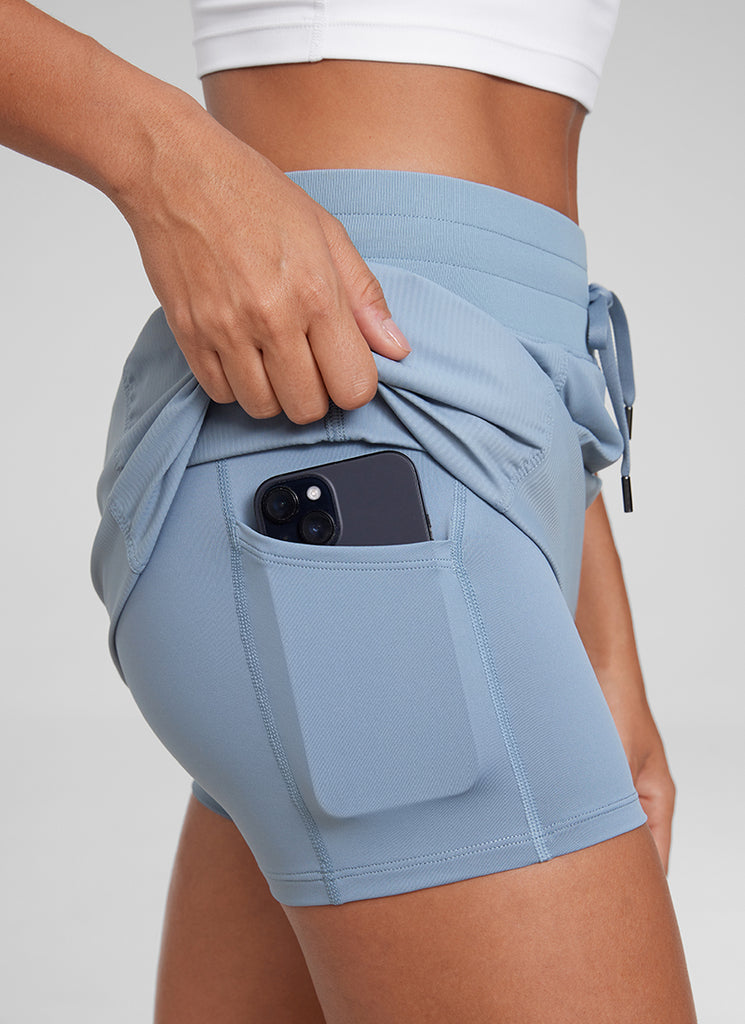 CRZ YOGA Women Golf Casual Athletic Drawstring Skirt with Side Pockets Cambric Blue