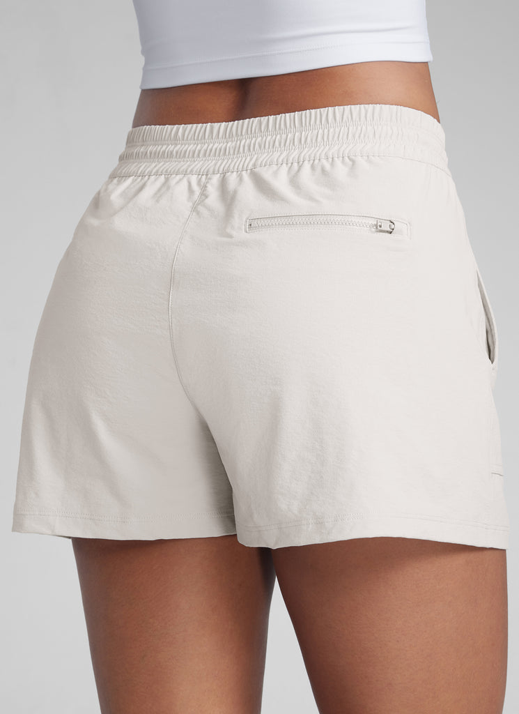 CRZYOGA Women's Lightweight Stretch Water-Repellent Hiking Pocket Short 3'' Milky White